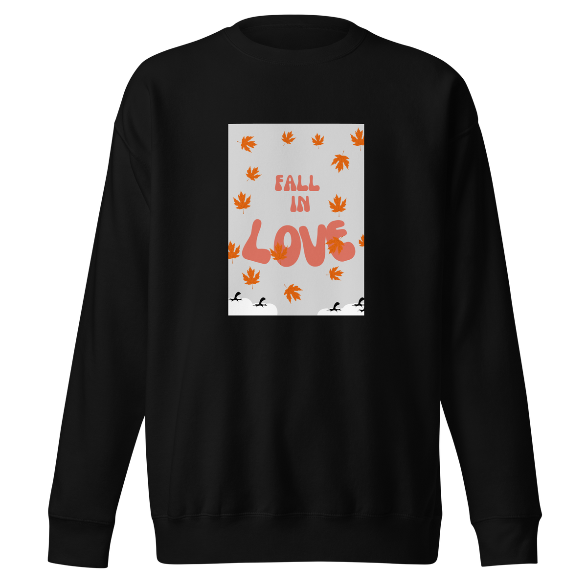 Black crewneck with a white photo background and orange leaves and orange text called fall in love written on it.