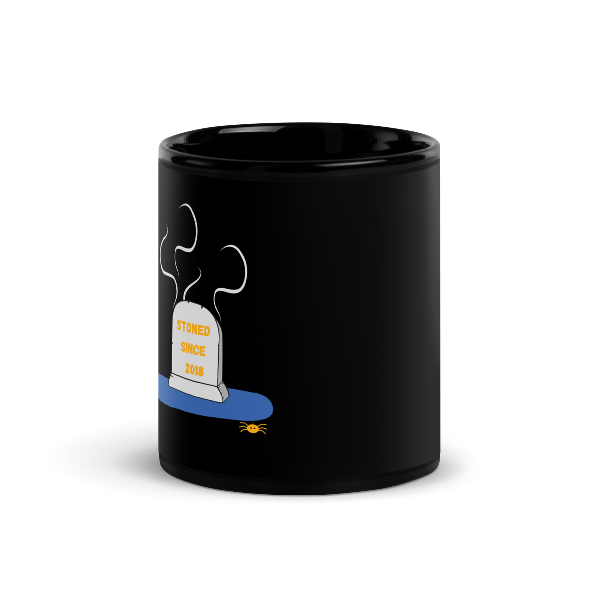 A black ceramic mug featuring a humorous graphic of a gray tombstone with 'STONED SINCE 2018' in yellow text, resting on a blue wave with a small yellow spider below, set against a plain white background.